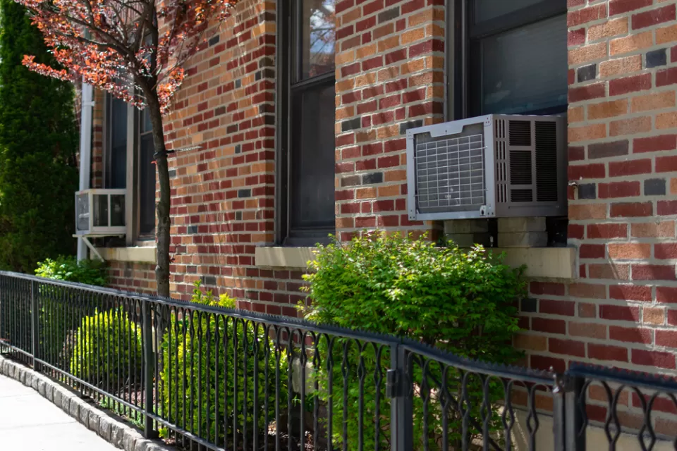 Window air conditioner units on a brick building